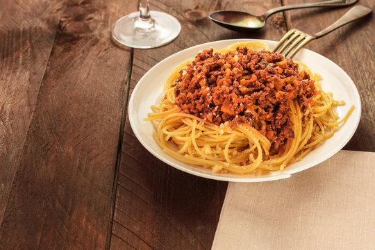 Plate of pasta with meat and tomato sauce
