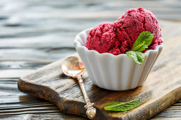 Bowl of ice cream of black currant.