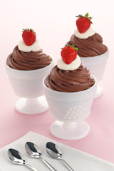 Three Chocolate Mousses with Whipped Cream