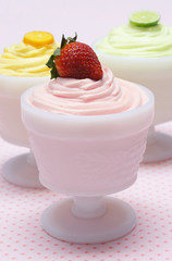 Three Flavors of Fruity Dessert Mousse on Pink Background