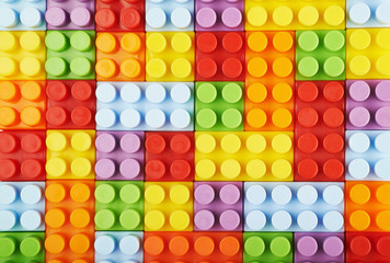 Surface covered with toy bricks