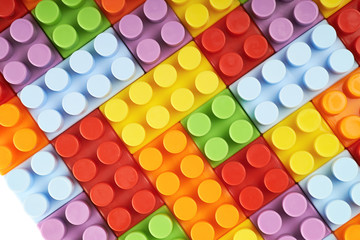 Surface covered with toy bricks