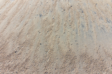 Sand in a steep hill background