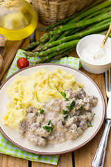 Ground beef in creamy cheese sauce with mashed potatoes