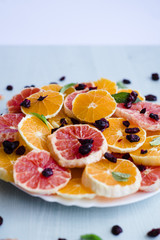 Orange and grapefruit salad with mint leaves