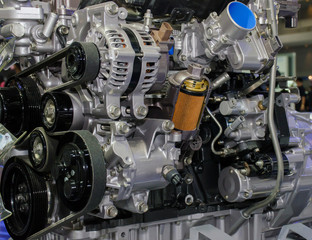 Engine oil filter cross section display inside machine motor in car.