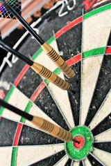 Darts game in dart board bullseye target stock, photo, photograph, image, picture, 