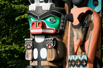 Native people totem pole. Handcrafted representation of unique culture.