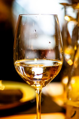 A glass of sparkling mineral water large. Visible bubbles in the water.
