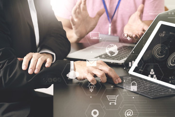 co working team meeting concept,businessman using smart phone and digital tablet and laptop computer in modern office