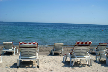 Fototapeta na wymiar Chaise longue summer beach