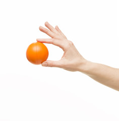  Hand with an orange ball