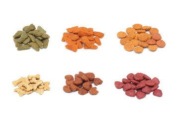 Piles of different types of dog food pellets