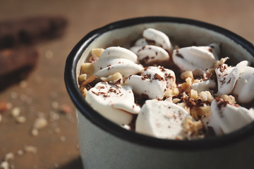 Cup of hot cocoa with marshmallows, closeup