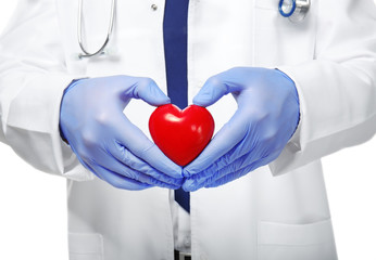 Handsome young cardiologist on white background