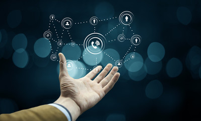 businessman touch a digital screen for business social networking