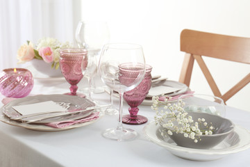 Beautiful table setting with silver cutlery