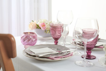 Beautiful table setting with silver cutlery