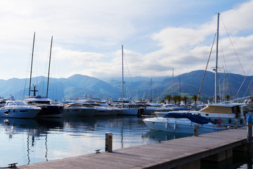 Fototapeta na wymiar Yachts at the marine of Kotor Bay, Tivat, Republic of Montenegro