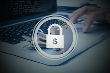 Binary code on laptop screen with finger clicking mouse pad trying to retrieve folder by paying ransom to hacker. Security technology concept.