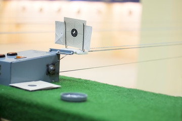 Shooting range counter with stilll target