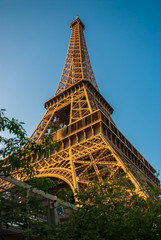 Eiffel Tower Tour Eiffel blue sky steel structure in evening sunset sunlight