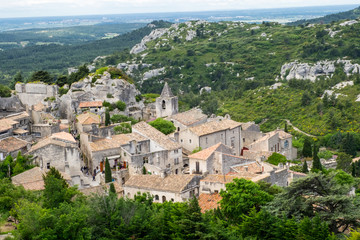 Fototapeta na wymiar Les Baux, in and around the old Chateau, castle, small town, ruins of fortress,on top of rugged rock Eperon Des Baux. Views of the old city from the Castle keep.