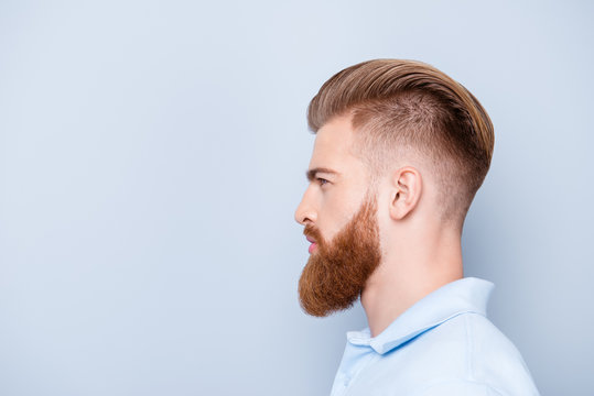 Advertising barbershop concept. Profile side portrait of confident handsome  red bearded young man. He has a perfect stunning hairstyle, modern haircut  Stock Photo | Adobe Stock