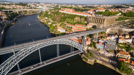 Naklejka premium Aerial view over Porto's old town, Ribeira, Duoro river the and the Porto Bridge (Luiz I Bridge), 17 May 2017.