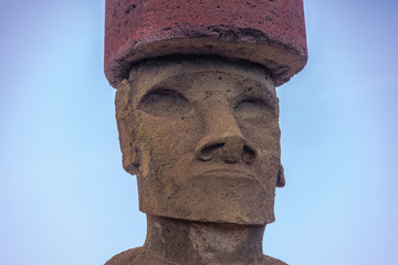 Close view of  Moai Statue Face of Ahu Nau Nau wearing topknot near Anakena Beach - Easter Island, Chile