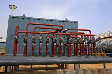 Naklejka premium Oil pipes and valves