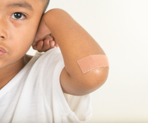 The wound in the child's arms.