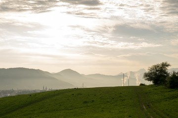 Fototapeta premium Sunrise and sunset over the hills and town. Slovakia
