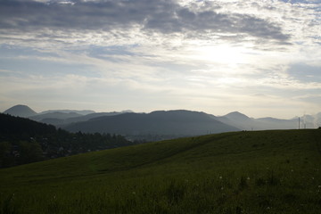 Obraz na płótnie Canvas Sunrise and sunset over the hills and town. Slovakia