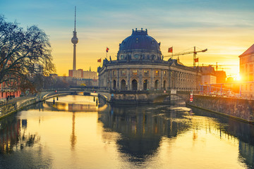 Fototapeta premium Museum Island on Spree river and TV tower in the background at sunrise, Berlin, Germany