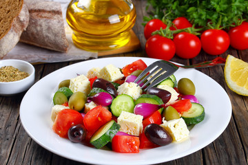 vegetable salad on white plate, close-up