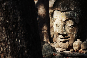 Fototapeta na wymiar Worship of buddha statue in Thailand, History of Thailand. Buddha statue at Chiangmai Historical temple. Chiang Mai Province, Thailand , Asia