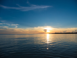 Panorama of beautiful sunset on the ocean.