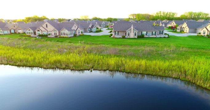 Springtime, beautiful neighborhoods, exceptional homes, aerial view at sunrise.
Duplex, quadruplex, multiplex, condominium.