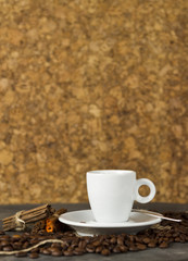 cup of coffee with coffee beans