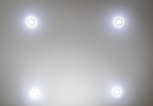 Four ceiling led lights closeup.