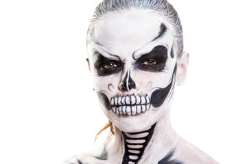 Girl with creative halloween face art on white background.