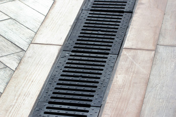 Rainwater drainage system on a sidewalk