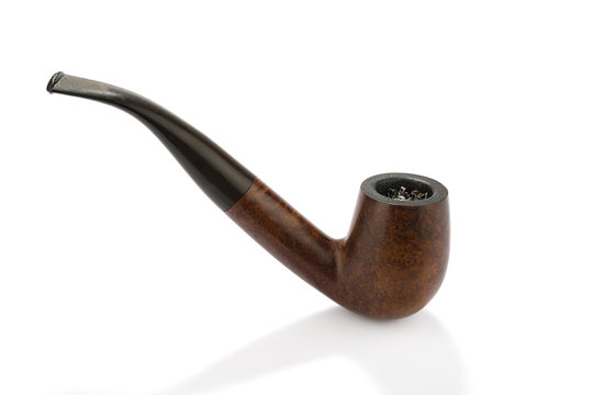 Used smoking pipe with burned tobacco isolated on white background.   