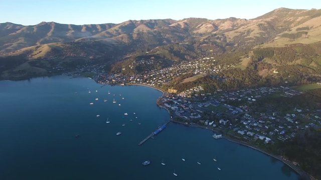 Establishing aerial shot of Akaroa, Banks Peninsula, New Zealand