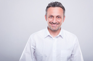 Engineer posing wearing white shirt and smiling