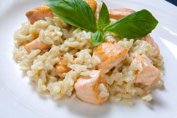 Risotto with salmon in a mild creamy sauce