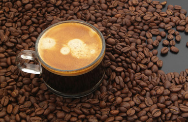 Espresso coffee with roasted arabica coffee beans