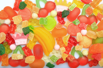 Tasty and colorful jelly candies on white background, closeup