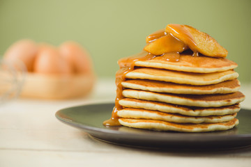 Pancakes with apple on table. Breakfast, snacks. Pancakes Day.
